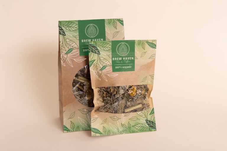 Custom-printed sustainable kraft packaging with window showing products inside